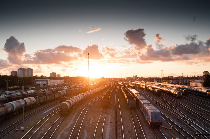 Train yard at sunset